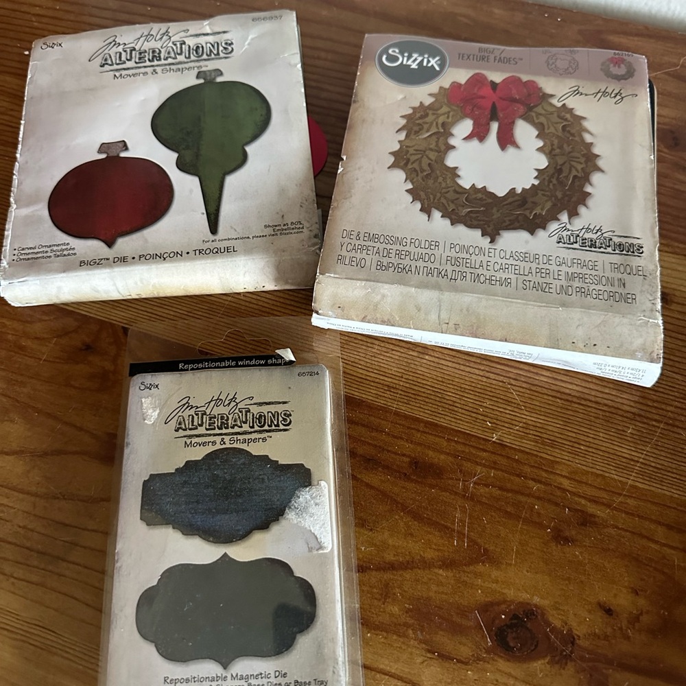 Tim Holtz Embossing Folder and wreath die and five other dies